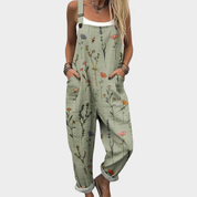 Lena Rasmussen | Blomstret overall i sage-grøn med vildblomster-print til kvinder