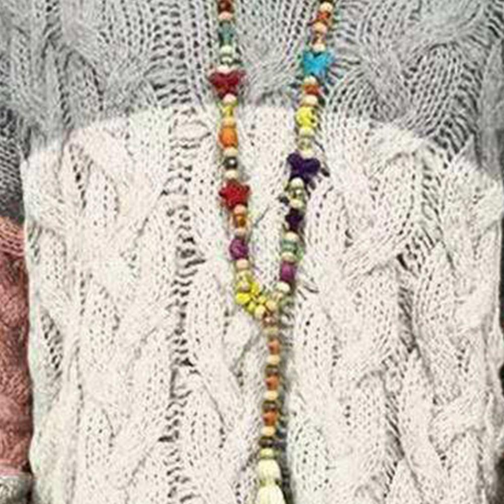 Signe Kristensen | Knitted hoodie sweater in a color-block design