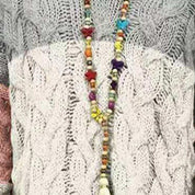Signe Kristensen | Knitted hoodie sweater in a color-block design