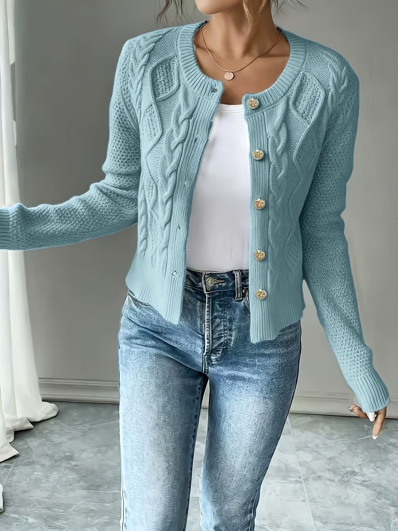 Katja Dam | Navy blue cardigan with buttons and cable knit