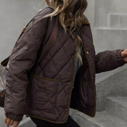 Mette Rasmussen | Wattierte Steppjacke mit Kragen in Dunkelbraun