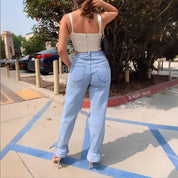 Zoe Harrington | Ripped mom jeans in light blue denim for women