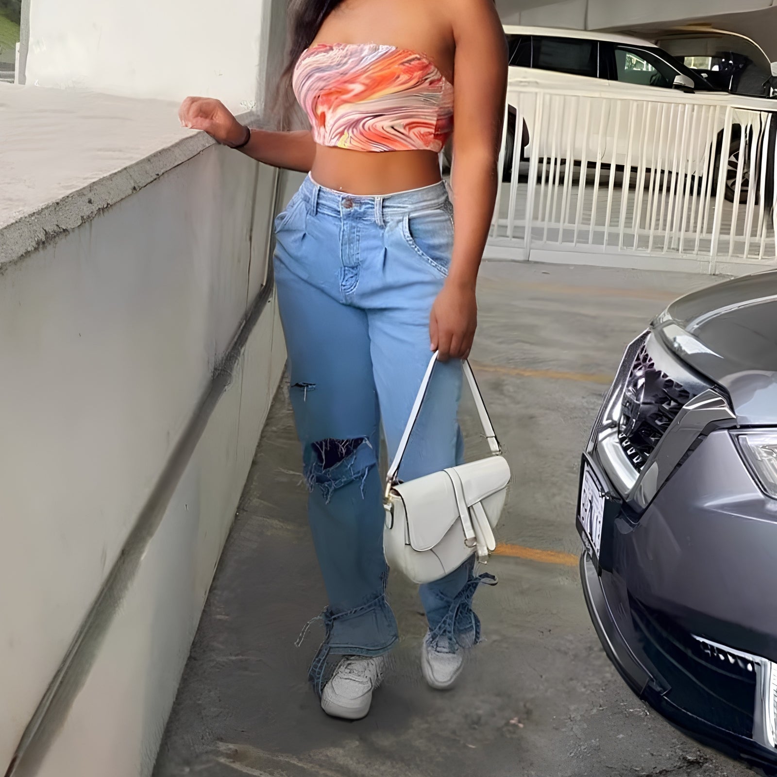 Zoe Harrington | Ripped mom jeans in light blue denim for women
