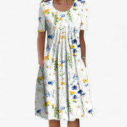 Nora Vestergaard | Midi-sommerkjole med blomsterprint