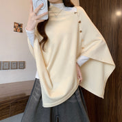 Louise Winther | Cape-frakke med knapper og oversized pasform