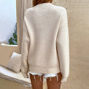 Laura Lund | Strickpullover mit Knöpfen und Rundhalsausschnitt