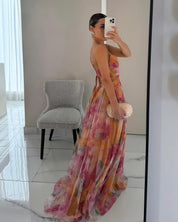 Rosalba Castellani | Maxi-blomsterkjole med wrap-snit til kvinder