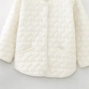 Louise Mortensen | Quilted cropped jacket with heart pattern