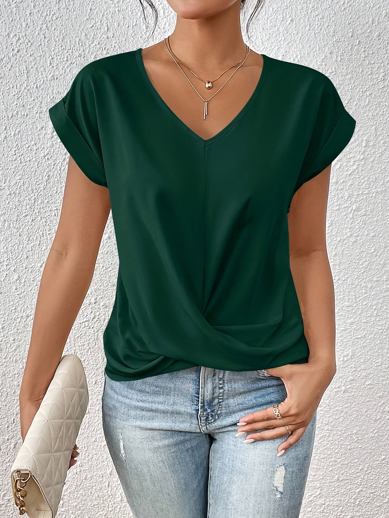Élodie Laurent | V-hals top med elegant knudedetalje