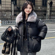 Josefine Thomsen | Oversized puffer jacket with fur collar