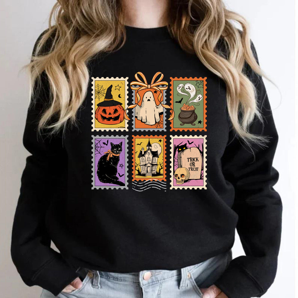 Halloweenský svetr Cauldron Cat | s koláží strašidelných razítek