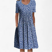 Nora Vestergaard | Midi-sommerkjole med blomsterprint