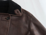 Stine Bang | Faux-shearling frakke med kontrastkrave
