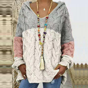 Signe Kristensen | Knitted hoodie sweater in a color-block design
