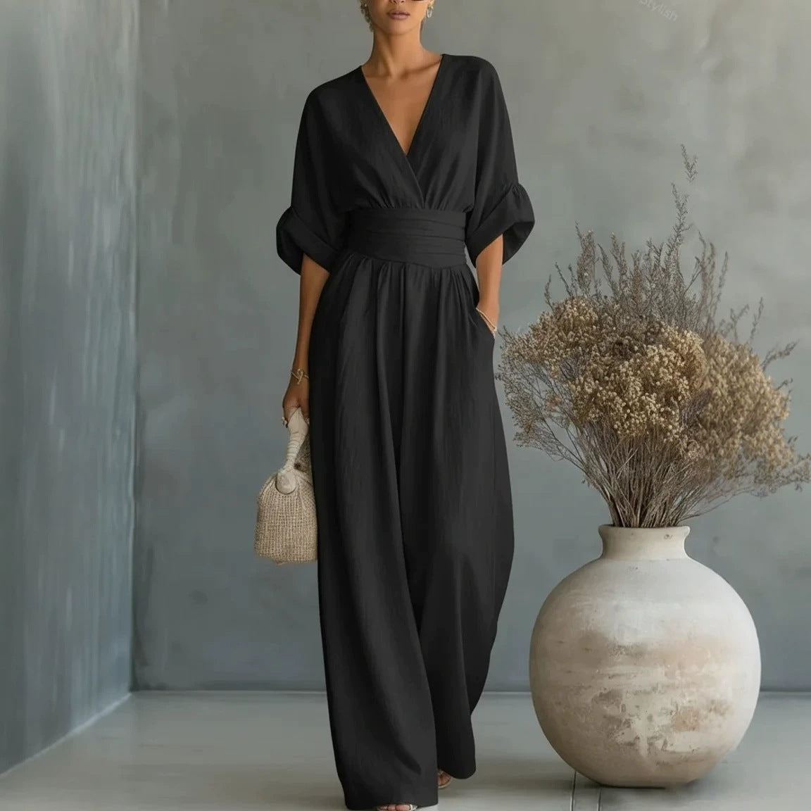 Renata Olivares | Wide-leg jumpsuit med V-hals til kvinder