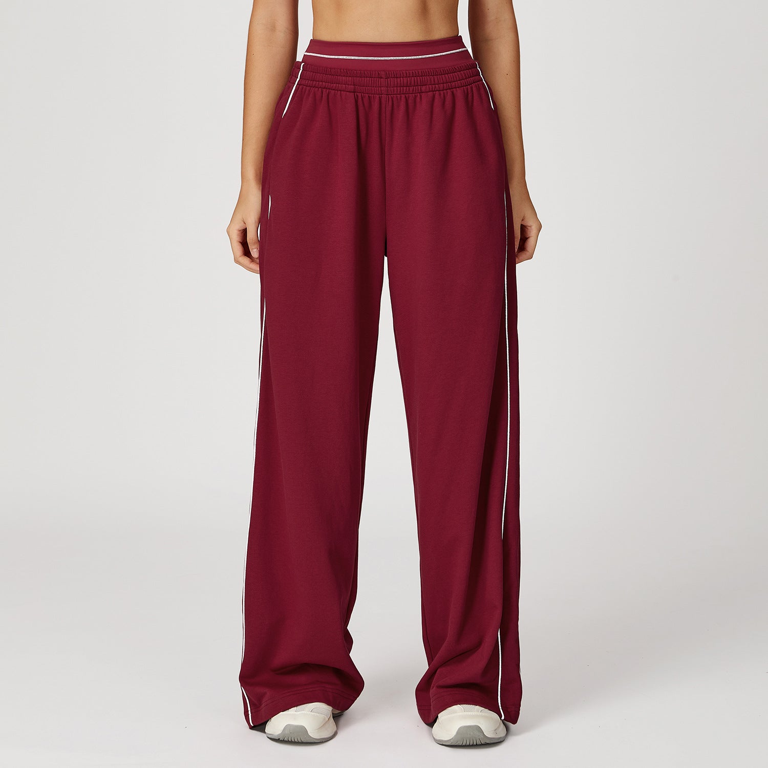 Louise Berg | Loose-fit Joggingbukser i sort med kontrastdetaljer