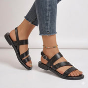 Isabeau Sorensen | Strappy Flat Sandals i sort læder