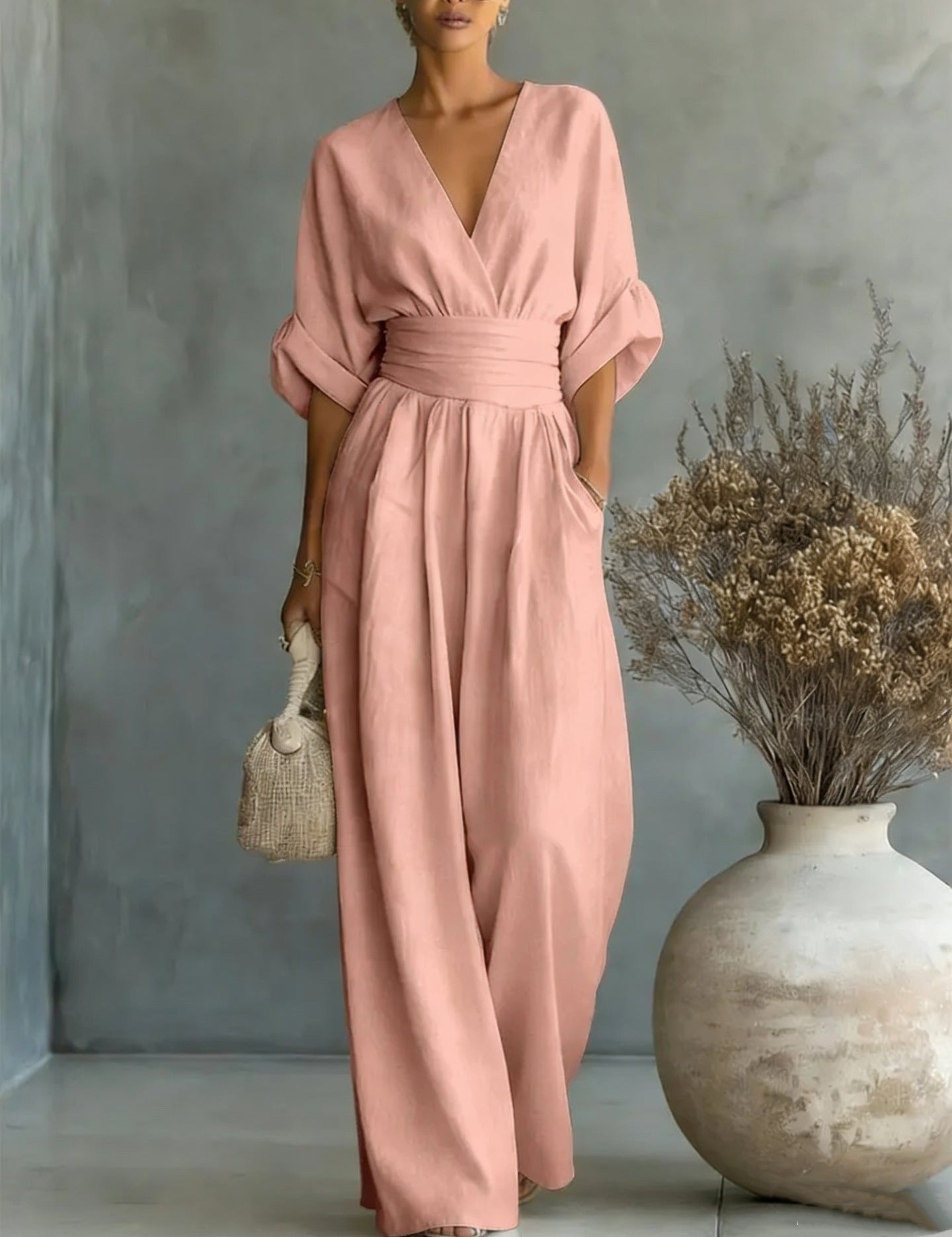 Renata Olivares | Wide-leg jumpsuit med V-hals til kvinder