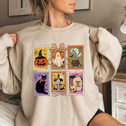 Halloweenský svetr Cauldron Cat | s koláží strašidelných razítek