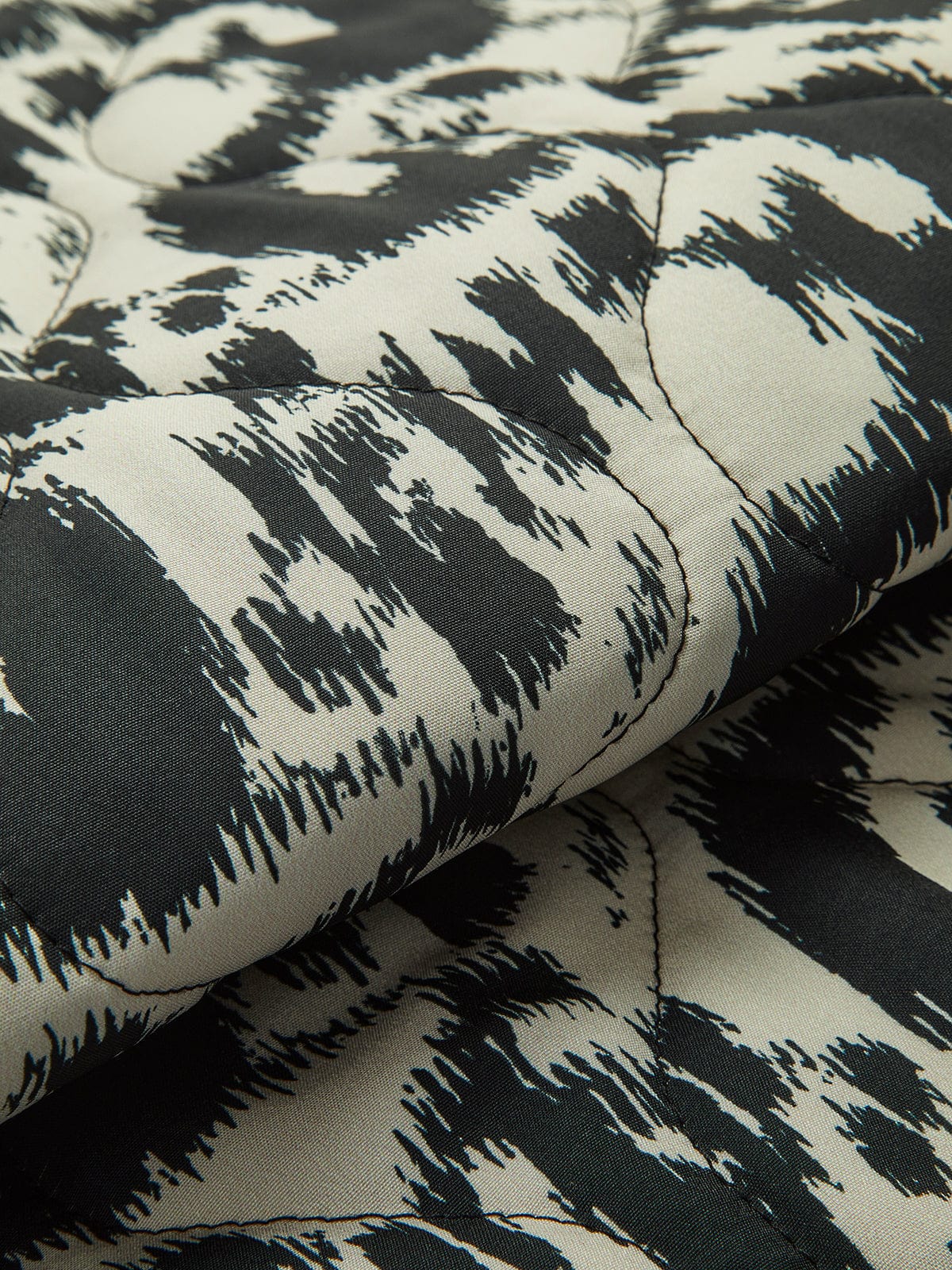 Aurore Castellano | Letvatteret Leopard-Print Jakke med Grafisk Kant