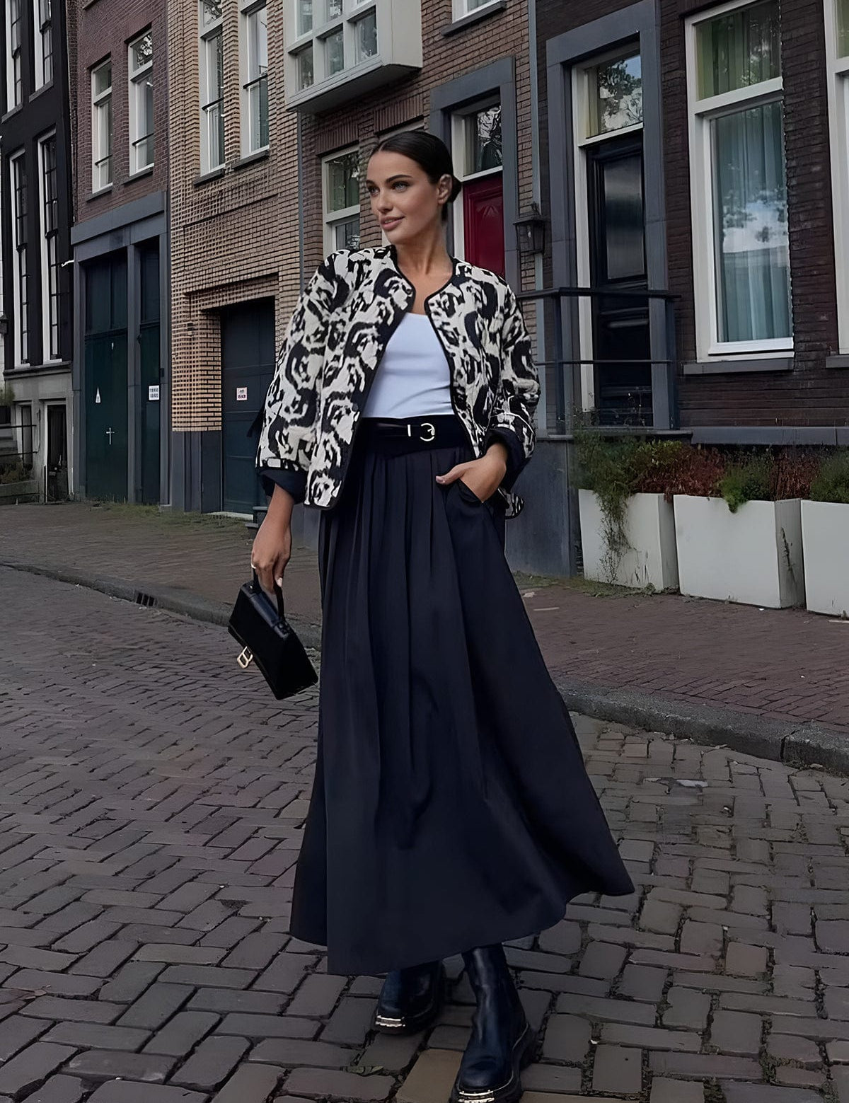 Aurore Castellano | Letvatteret Leopard-Print Jakke med Grafisk Kant
