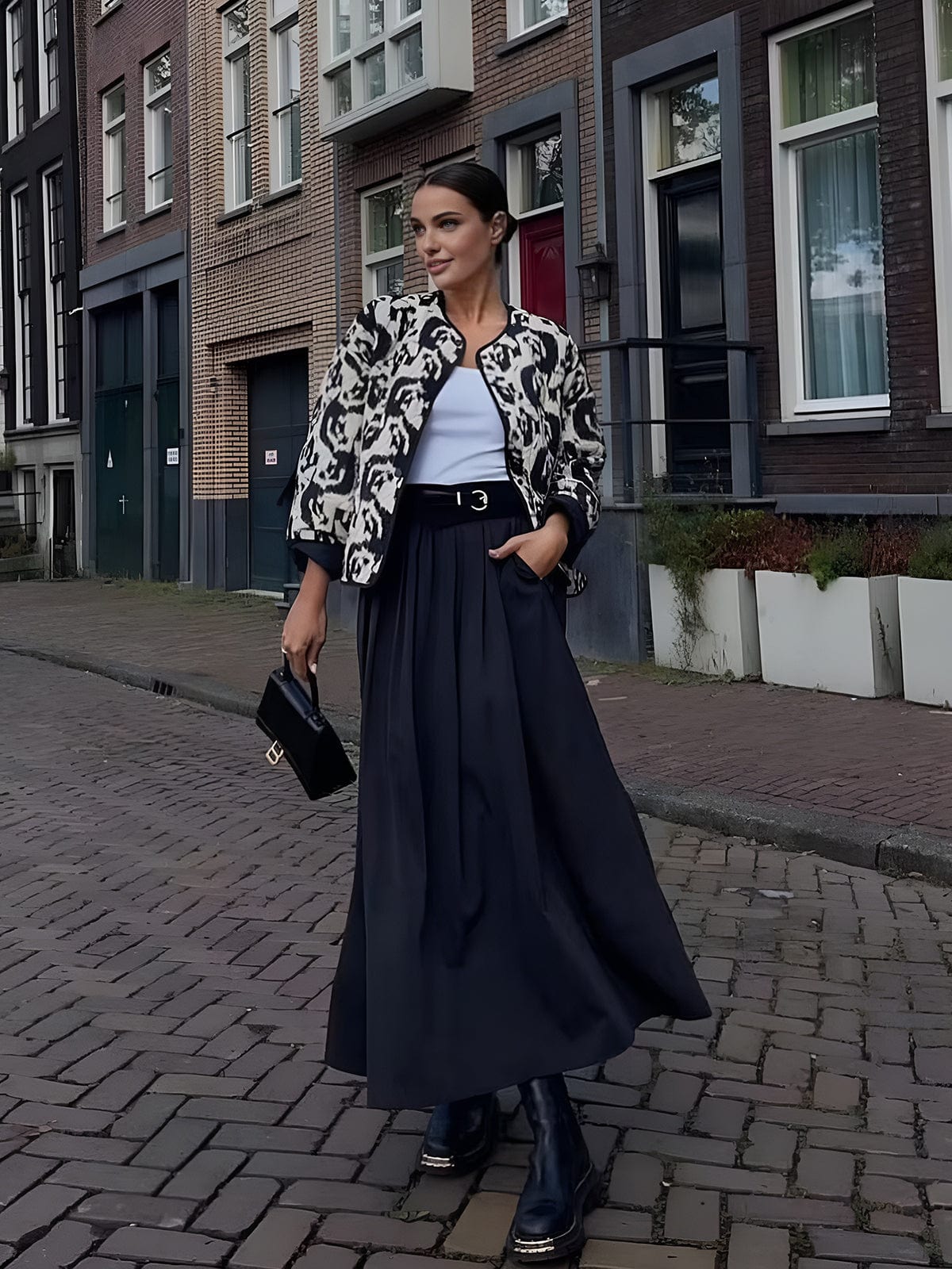 Aurore Castellano | Letvatteret Leopard-Print Jakke med Grafisk Kant