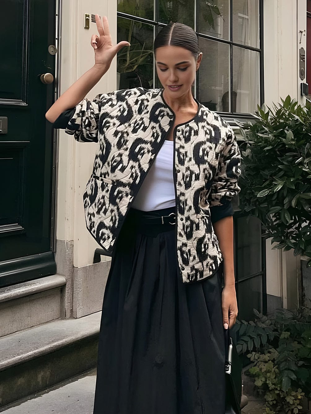 Aurore Castellano | Letvatteret Leopard-Print Jakke med Grafisk Kant