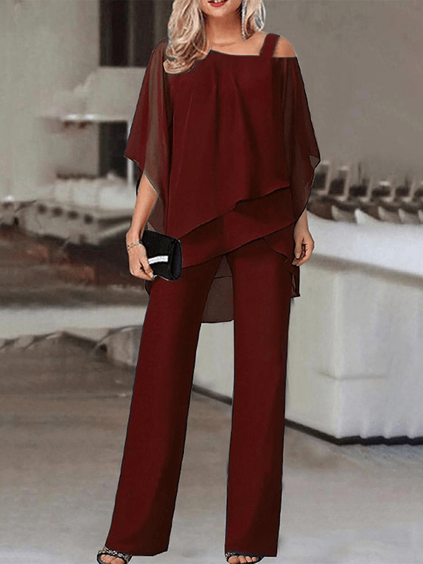 Adrienne Salvatore | Elegante to-delt sæt med asymmetrisk chiffon-overdel og vide bukser