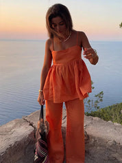 Aurore Valenti | Sommersæt i orangered med spaghetti-top og vide bukser