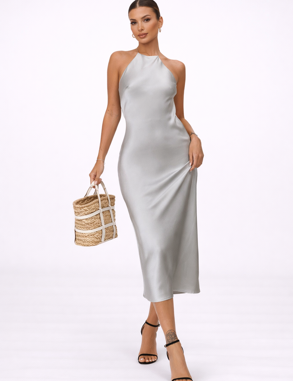 Elegantwomaninsilver-greydress.png