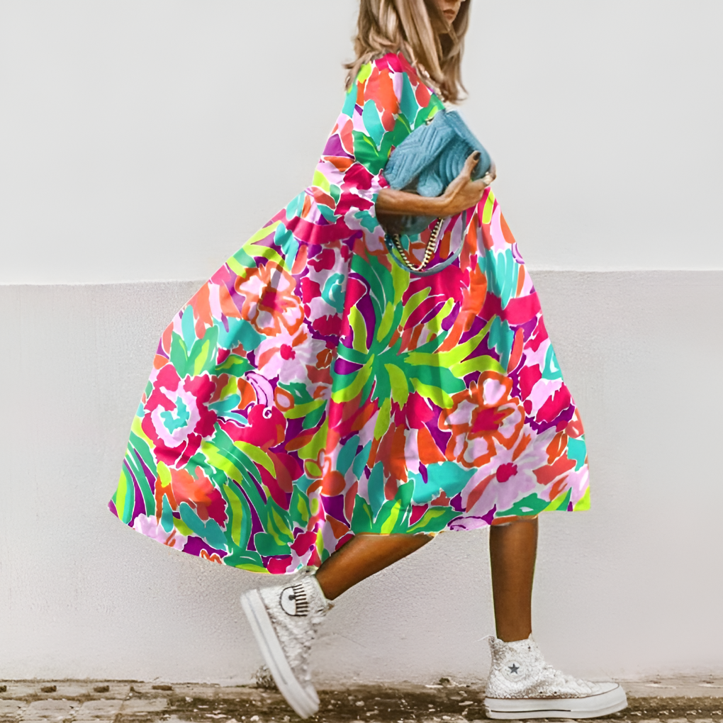Camille Renard | Floral luksus midi kjole med pufærmer