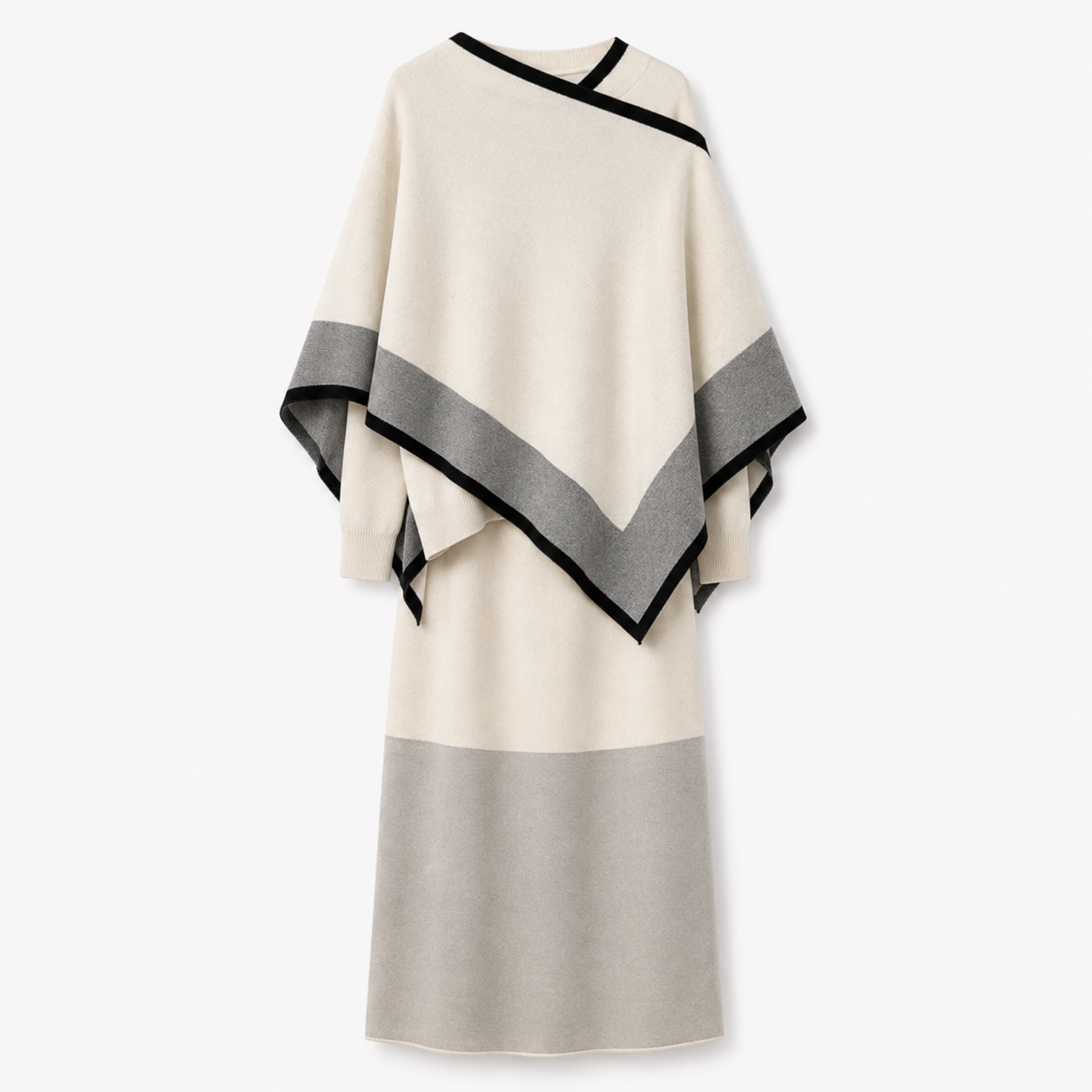 KarinaHoltCape-saetmedstrikketkjoleimidi-laengde-item.png
