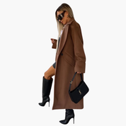 Geneviève Laurent | Lang damefrakke med elegant reverskrave og tidløs silhuet