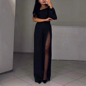 Serena Villanueva | Sort jumpsuit med mesh-pailletpanel og lange ærmer til kvinder