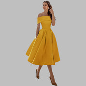 Isabella Conti | Luksus off-shoulder midi gallakjole i satin