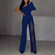 Serena Villanueva | Sort jumpsuit med mesh-pailletpanel og lange ærmer til kvinder