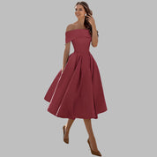 Isabella Conti | Luksus off-shoulder midi gallakjole i satin