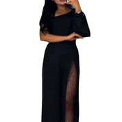 Serena Villanueva | Sort jumpsuit med mesh-pailletpanel og lange ærmer til kvinder
