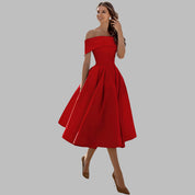 Isabella Conti | Luksus off-shoulder midi gallakjole i satin
