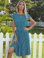 Sophie Moreau | Midi-kjole med plisseret design og klassiske prikker