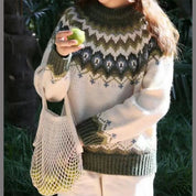 Sophie Whitmore | Nordisk striksweater med tidløs elegance