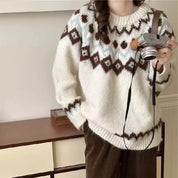 Sophie Whitmore | Nordisk striksweater med tidløs elegance