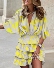 Sienna Bellucci | Mini wrap-kjole med blomsterprint
