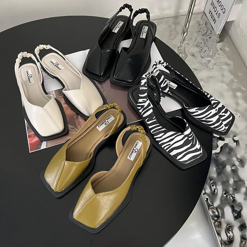 Celeste Whitmore | Slingback sandaler med minimalistisk elegance