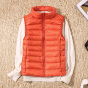 Signe Dahl | Lightweight blue down vest with a stand-up collar