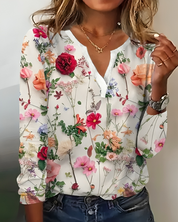 Rosanna Bellini | Blomsterprintet bluse med V-udskæring og lange ærmer