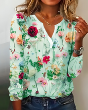 Rosanna Bellini | Blomsterprintet bluse med V-udskæring og lange ærmer