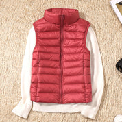 Signe Dahl | Lightweight blue down vest with a stand-up collar