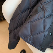 Ingrid Olsen | Schwarze gesteppte Jacke mit Rautenmuster