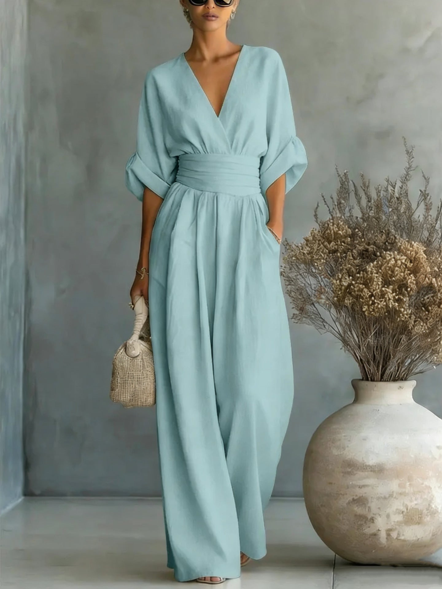 Renata Olivares | Wide-leg jumpsuit med V-hals til kvinder